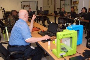 Tom Meeks teaches YouthQuest's first 3D printing class at Freestate ChalleNGe Academy