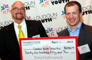 YouthQuest Foundation Co-Founder and Vice President Allen Cage presents a check to Loudoun Youth President and CEO Jared Melvin at the 2014 Step Up Loudoun Youth competition.