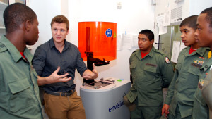 UMD grad student Tony Melchiorri tells Capital Guardian students how this 3D printer helps him make blood vessel grafts. at Maryland NanoCenter Oct. 17, 2014