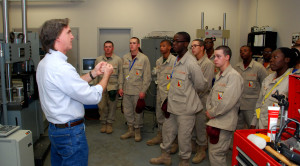 Dr. David Rocheleau leads a tour of a mechanical engineering lab at the University of South Carolina during vocational orientation for YouthQuest's 3D ThinkLink students from the South Carolina Youth ChalleNGe Academy Oct. 23, 2014.