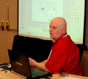 YouthQuest Director of Instruction Tom Meeks shows students how to use Moment of Inspiration 3D design software in a workshop at the NSBE convention in Anaheim, California, March 26, 2015.