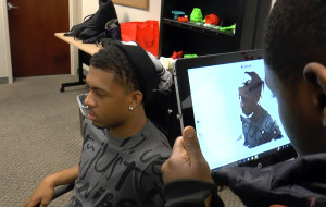 Amadou Abakar scans Nate Sydnor while the Capital Guardian Youth ChalleNGe Academy graduates evaluate 3D scanners during January 2016 immersion week in YouthQuest's 3D ThinkLink Creativity Lab 