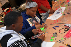 South Carolina Youth ChalleNGe Academy graduate Kimora Felton and and Freestate ChalleNGe Academy graduate Josh Nembhard build a JellyBox 3D printer during January 2016 immersion week in YouthQuest's 3D ThinkLink Creativity Lab