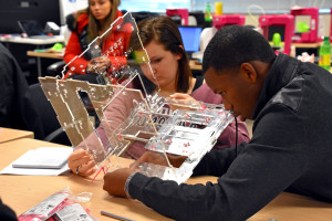 South Carolina Youth ChalleNGe Academy graduate Emilee Bray and and Freestate ChalleNGe Academy graduate Osman Bah build a JellyBox 3D printer during January 2016 immersion week in YouthQuest's 3D ThinkLink Creativity Lab