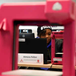 SDouth Carolina Youth ChalleNGe Academy graduate Kimora Felton sets up a 3D printer in the 3D ThinkLink Creativity Lab during immersion training week January 5, 2016