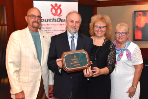 IMADE3D owners Ladi Goc and his wife, Ivana Gocova, accept our 2017 Strategic Partner Award from YouthQuest Co-Founders Allen Cage and Lynda Mann at the foundation's annual VIP Reception on August 3.