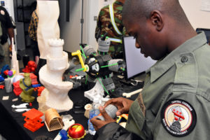 A 3D ThinkLink student from DC's Capital Guardian Youth ChalleNGe Academy examines 3D-printed objects at the University of Maryland's MakerBot Innovation Center in College Park as part of his Vocational Orientation experience on October 24, 2017.