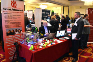 YouthQuest Director of Instruction Tom Meeks at the foundation's display at the Greater Washington Innovation Awards Showcase in March 2017