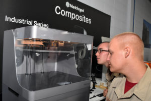 3D ThinkLink students from South Carolina Youth ChalleNGe Academy watch a 3D printer work whyile visiting Duncan-Parnell in Charlotte, NC, for Vocational Orientation