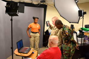 South Carolina Youth ChalleNGe Academy Cadet Cassie Myers works with other 3D ThinkLink students to test a handheld 3D scanner during Lab Week in May