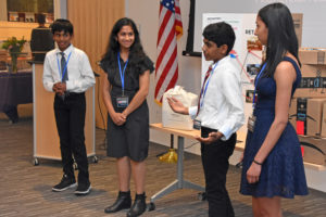 The iloom team answers questions from the judges at the final round of the Step Up Loudoun Youth Competition.