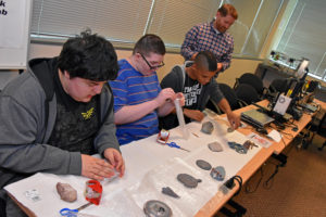 3D ThinkLink students from the PHILLIPS Schools wrap up the 3D-printed artifact models to be shipped to the iTech Preparatory students in Washington who 3D scanned the objects from the Fort Vancouver National Histortic Site.