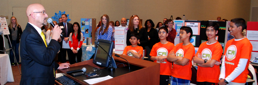 YouthQuest Foundation Co-Founder and Vice President Allen Cage speaks at the 2014 Step Up Loudoun Youth Competition