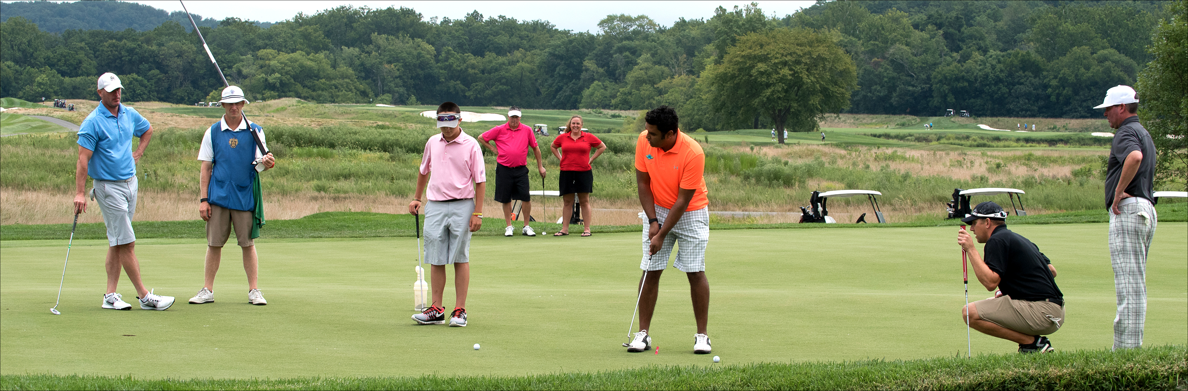 Golfers at YouthQuest's 10th Annual Challenge at Trump National Golf Club August 10, 2015