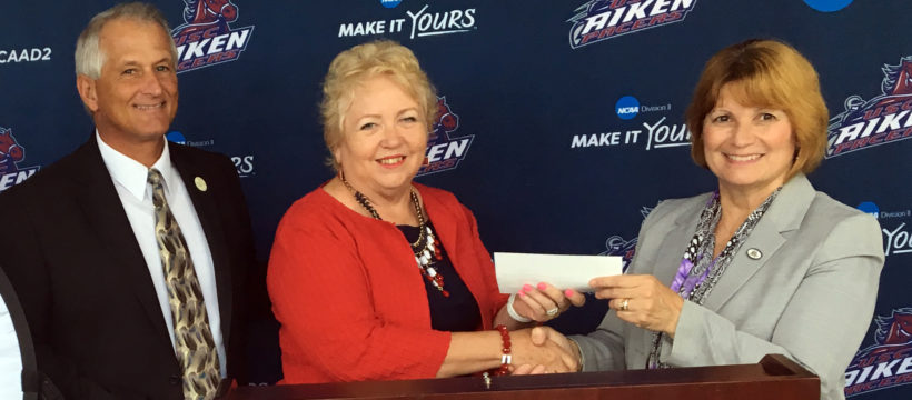 YouthQuest Co-Founder and President Lynda Mann presented a check to The First Tee of Aiken Chairman of the Board Tony Allman and USC Aiken Vice Chancellor for Advancement Mary Driscoll on August 22., 2016