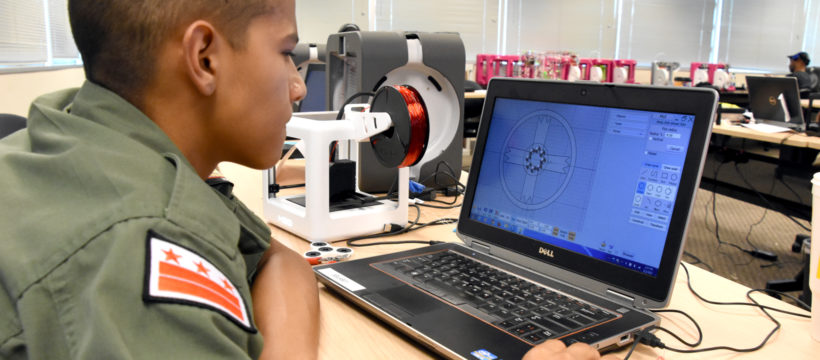 Adrian Vasquez works on a 3D design in YouthQuest's 3D ThinkLink Creativity Lab