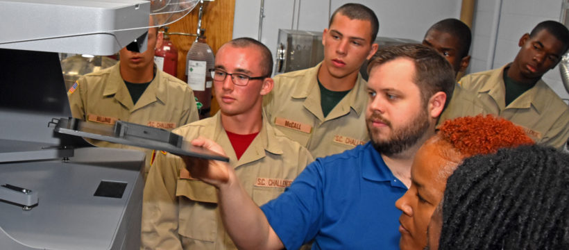 Ian McCormick leads a Vocational Orientation tour of Duncan-Parnell's 3D printing facility in Charlotte, NC, for 3D ThinkLink students from South Carolina Youth ChalleNGe Academy