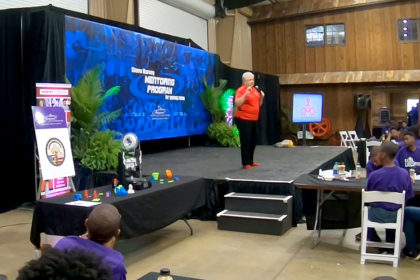 YouthQuest President Lynda Mann speaks about 3D ThinkLink Initiative at Steve Harvey mentoring camp June 15, 2019