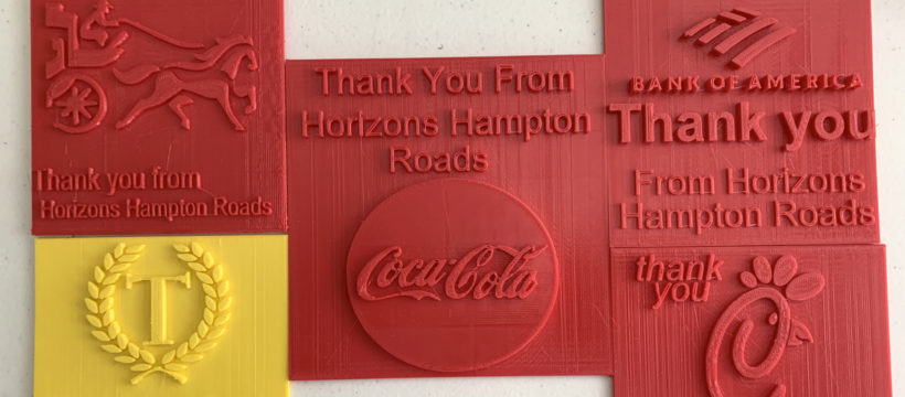 3D-printed plaques students made to thank sponsors of the Horizons Hampton Roads Summer Enrichment Program
